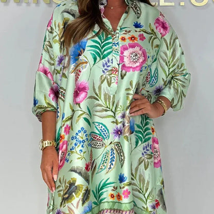 Loose dress with V-neck and half button placket with floral pattern